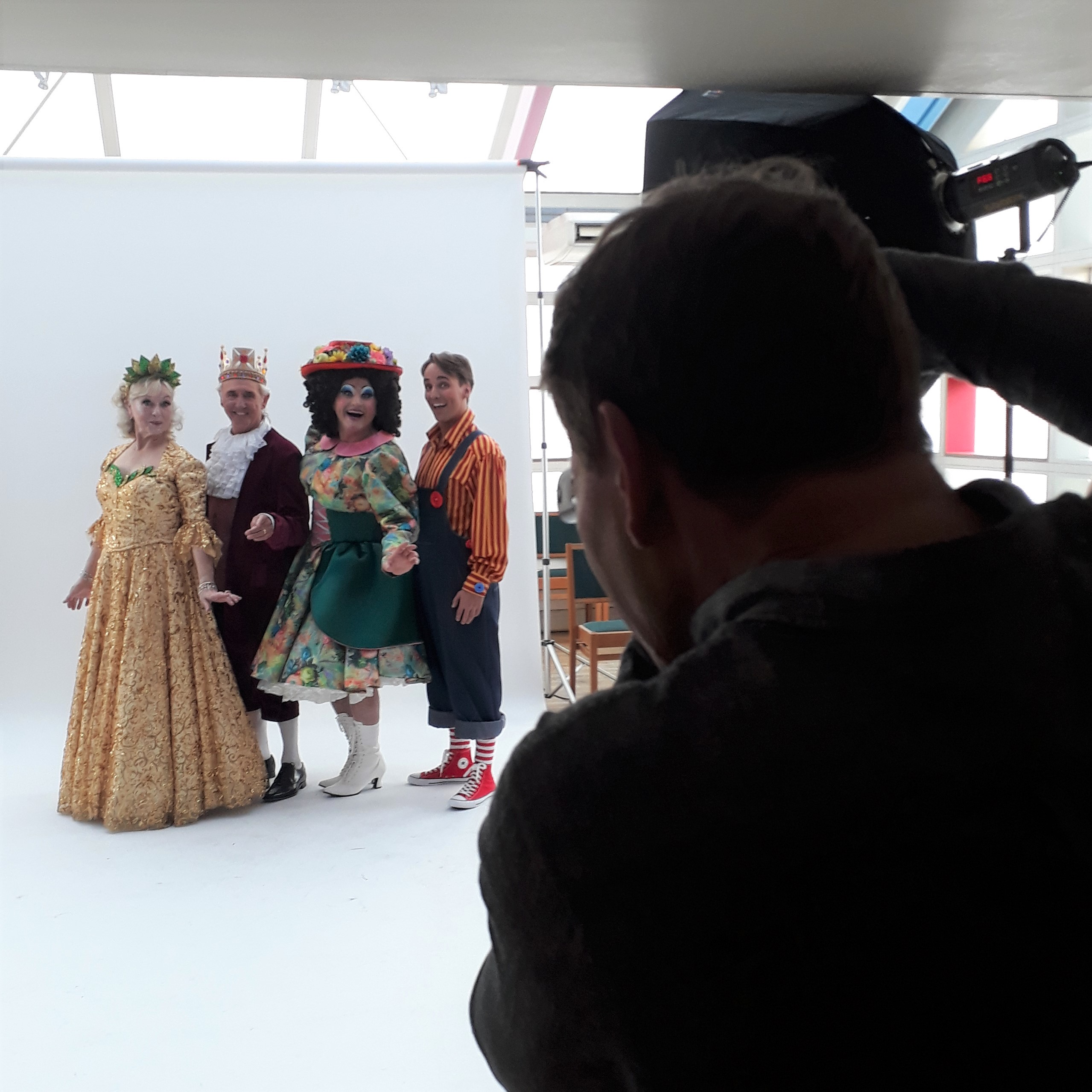 Four pantomime actors having their photograph taken at the photo-shoot