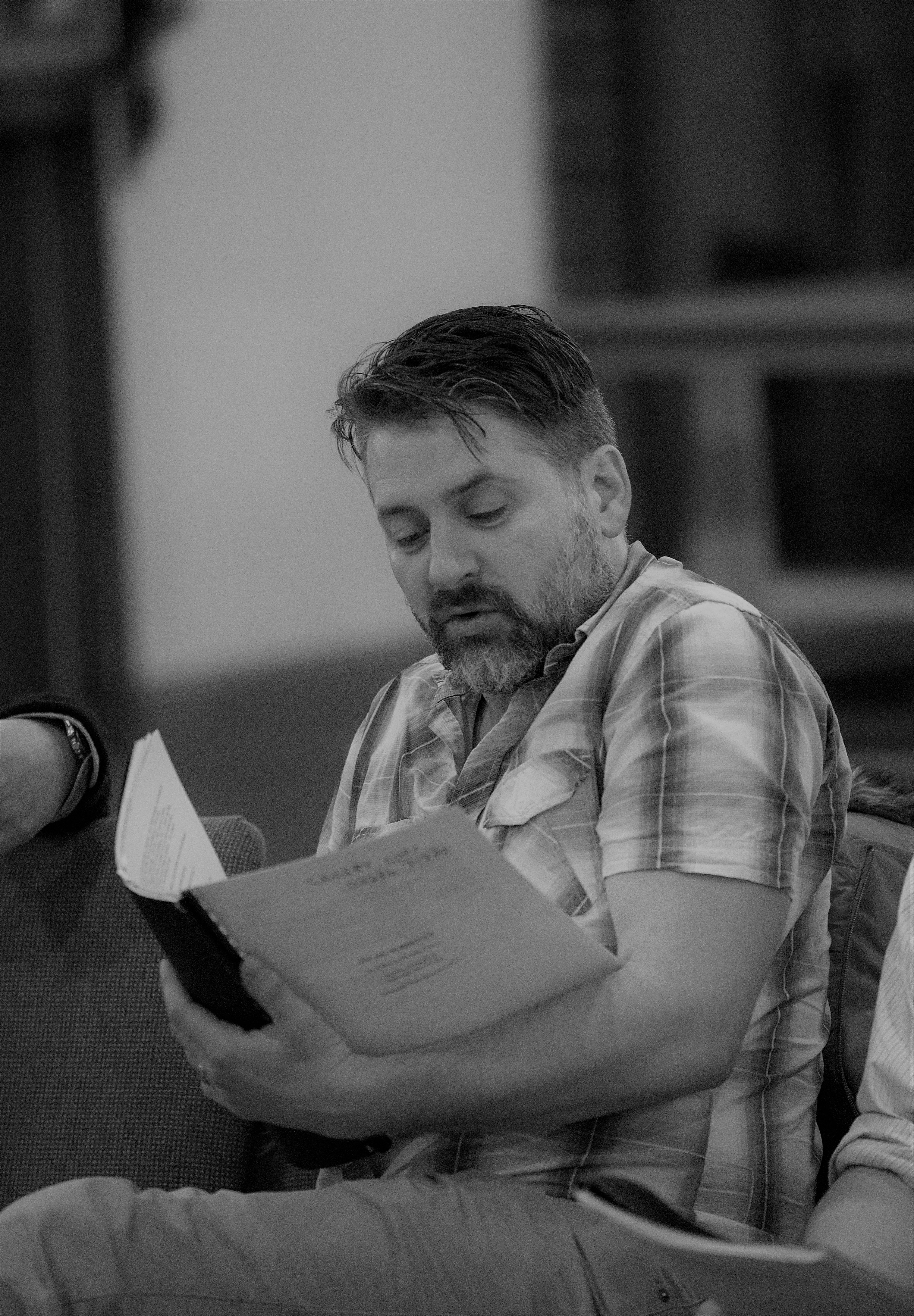 Man reading script