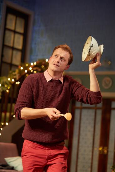 Man with a colander for a hat