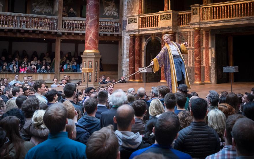 A man points his sword at the audience