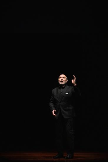 David Suchet talking on stage