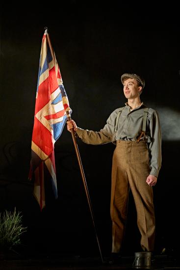 Soldier waving British flag
