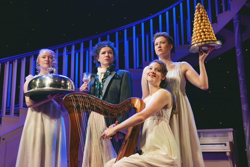 Four women wearing petticoats, they are playing a harp, carrying a silver platter and a croquembouche dessert