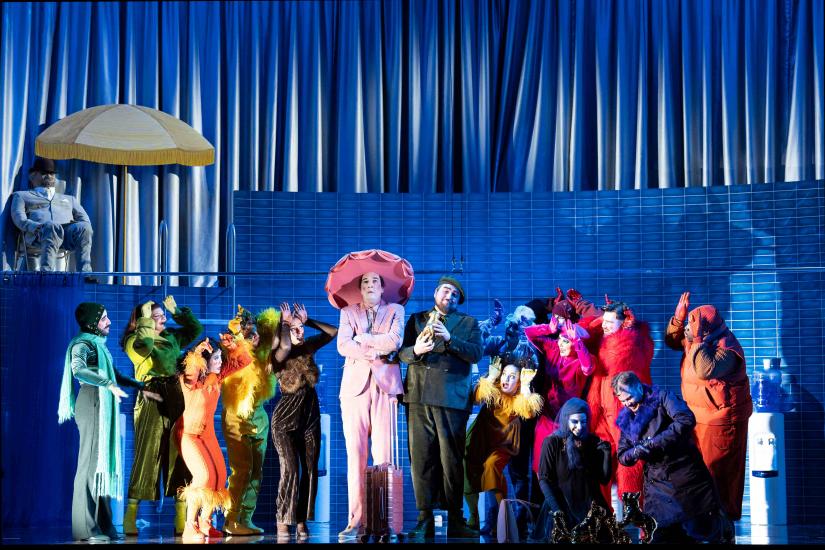 Cast of Manon Lescaut in costume with blue set