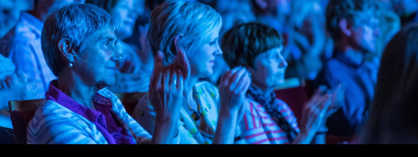 Audience members in Cambridge Arts Theatre auditorium