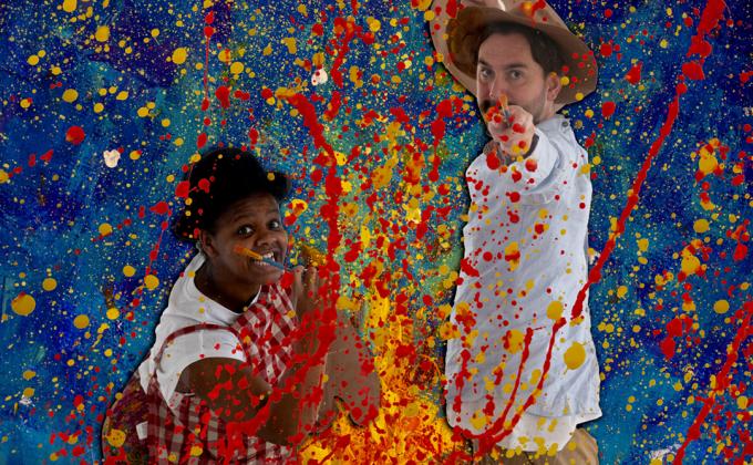 Two people holding paintbrushes with multicoloured paint splashes