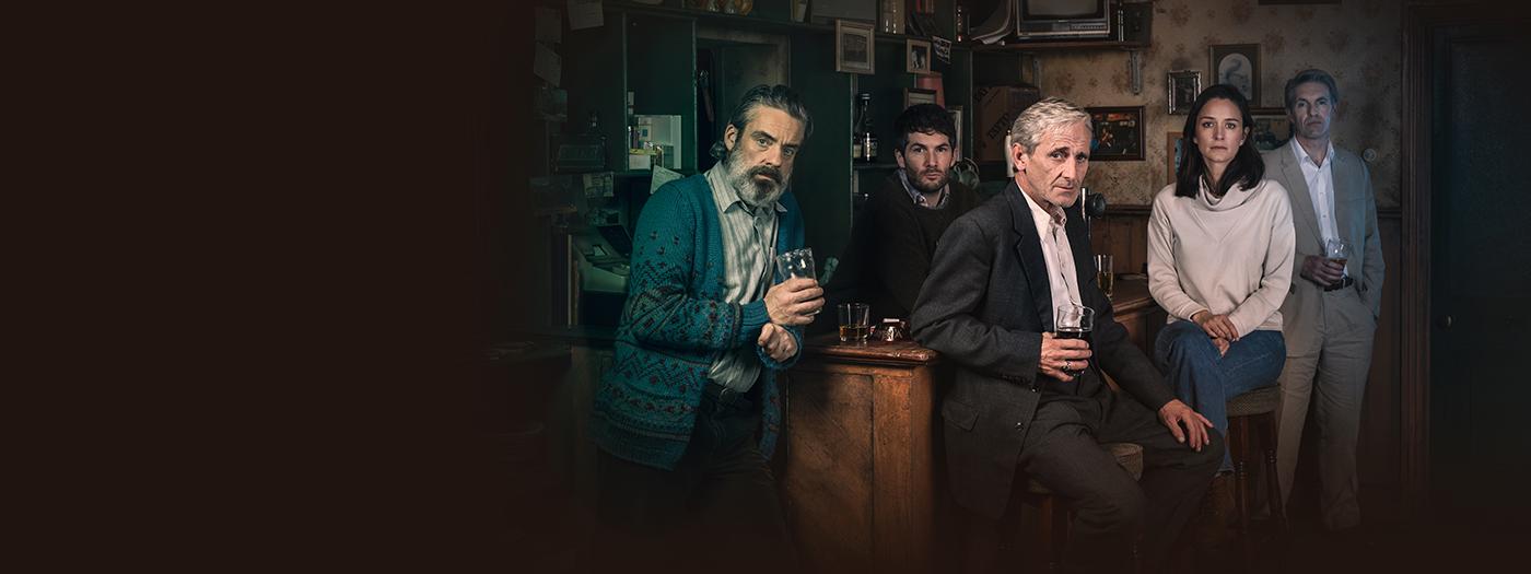 The Weir - cast sit round a bar with pints