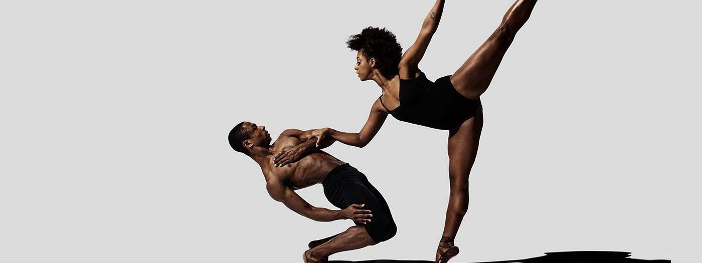 Two dancers appear to levitate in the air mid-dance