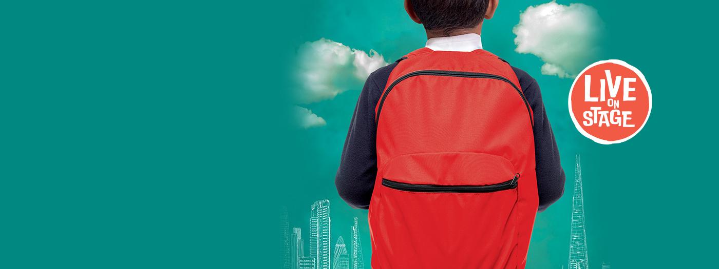 A boy is wearing a red backpack, he has dark skin and hair, he faces away from the image so you can't see his face.