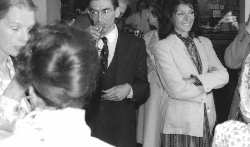 Audience members at the bar